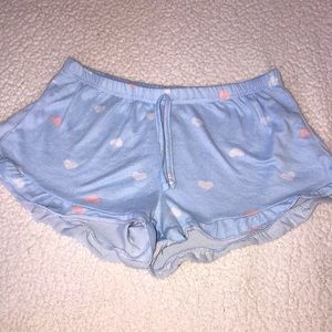 Blue pajama shorts with heart designs